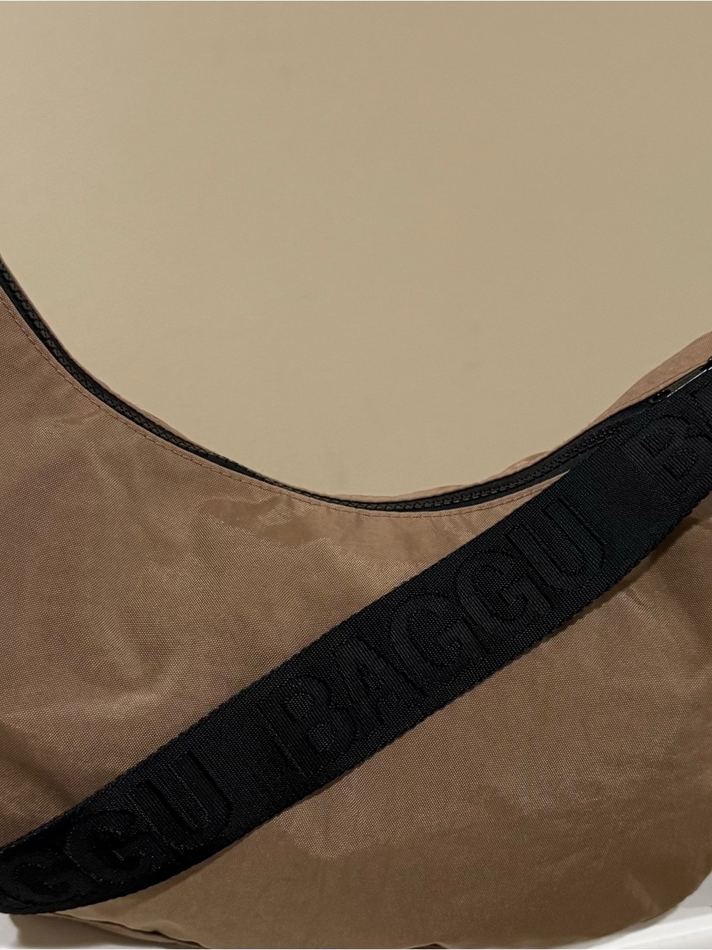 BAGGU Crescent Shoulder Bag in Taupe with Black Logo Strap